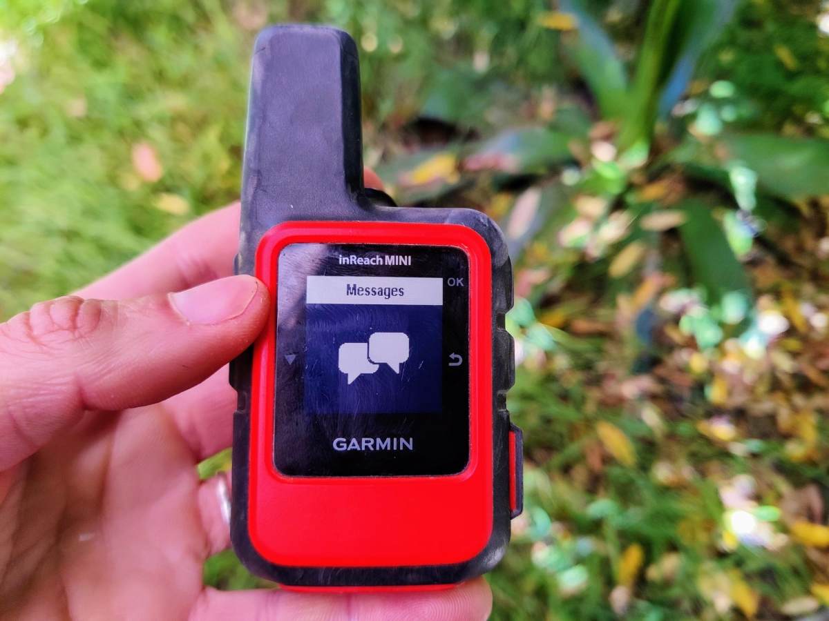 Close up of Garmin InReach Mini in hand